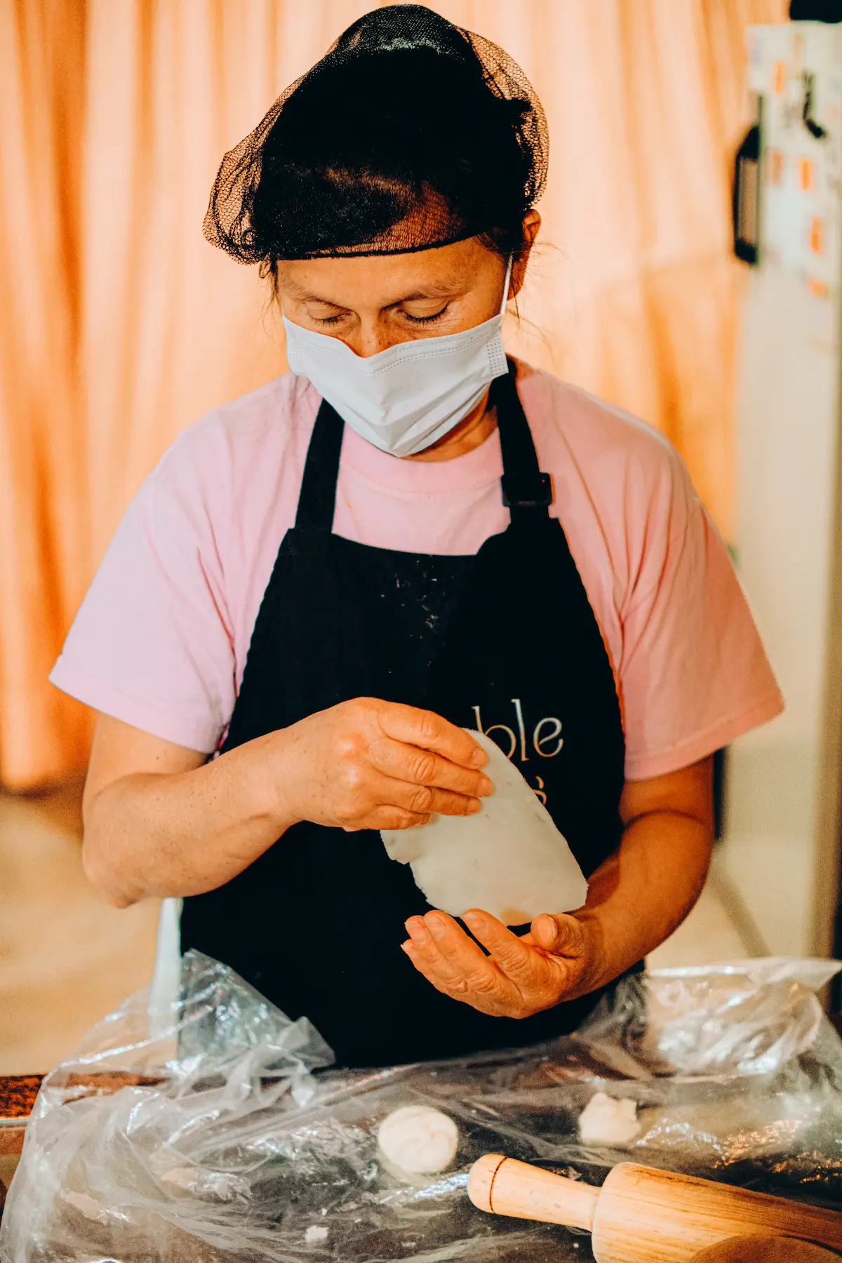 A local colombian chef making carimañolas